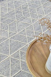 Albino Fringe Blue White Wool Rug