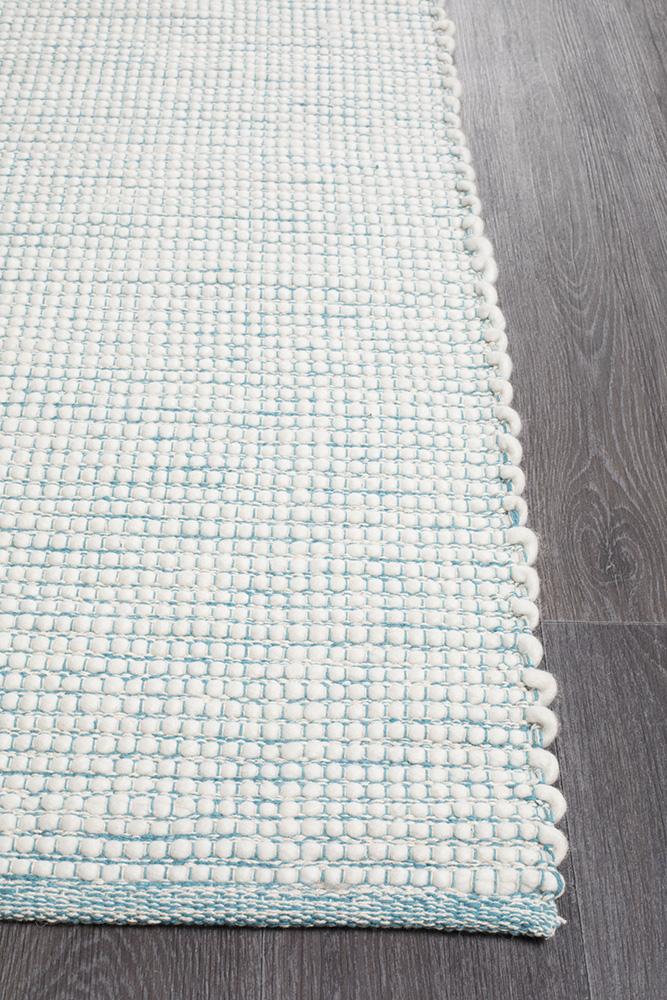 Ninnutsg Folt Wool turquoise Rug