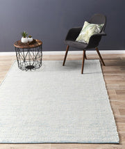 Ninnutsg Folt Wool turquoise Rug
