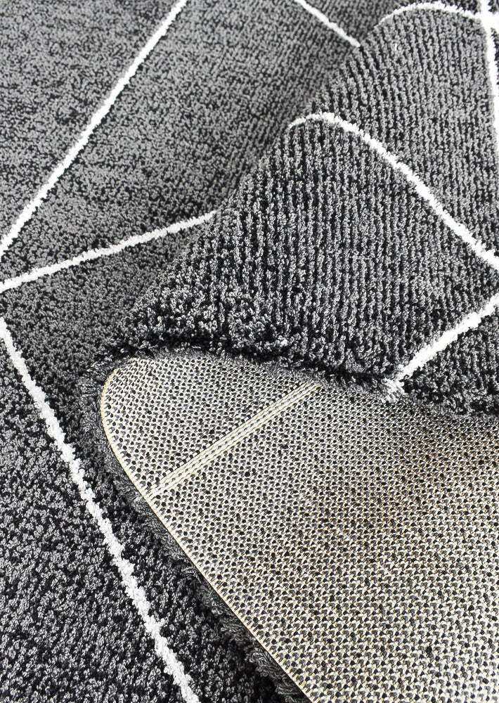 Vicinal Bibber Black Rug