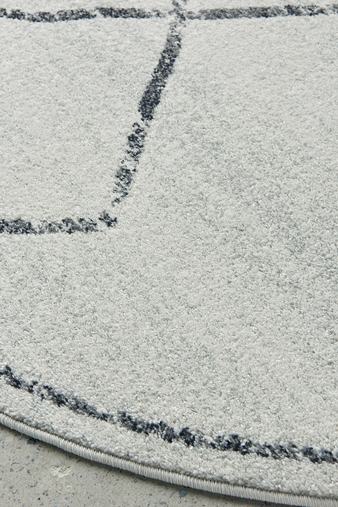 Elysium Boomerang Round Rug