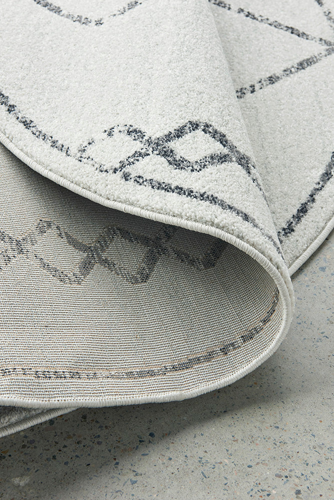 Elysium Boomerang Round Rug